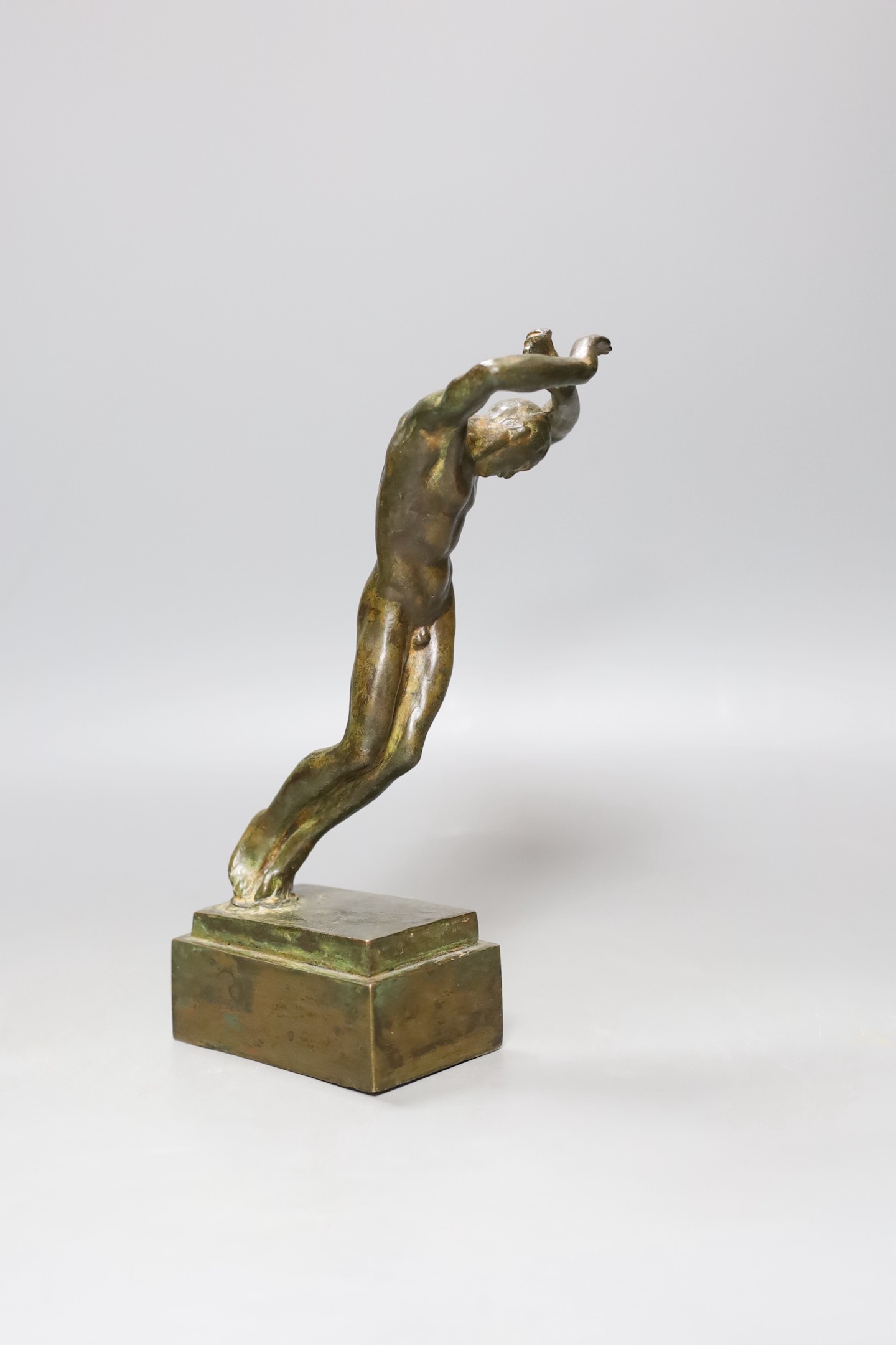 An Italian bronze figure of a nude man in dancing stance - 22cm tall